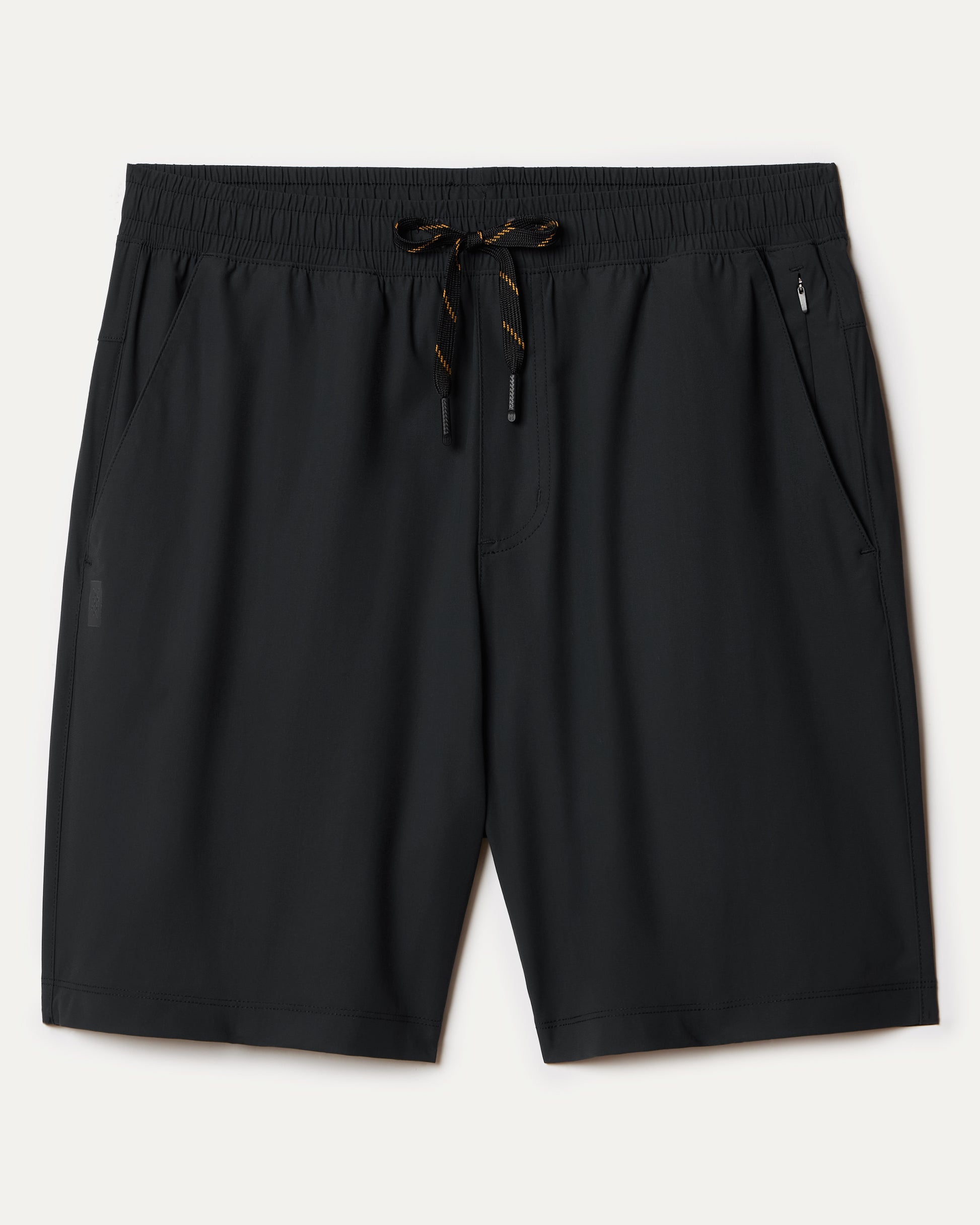 South Moon Under Pursuit Shorts 7 In Unlined in black feature a standard fit, elastic waistband, two side pockets, and a right zipper pocket, shown laid flat on a light background.