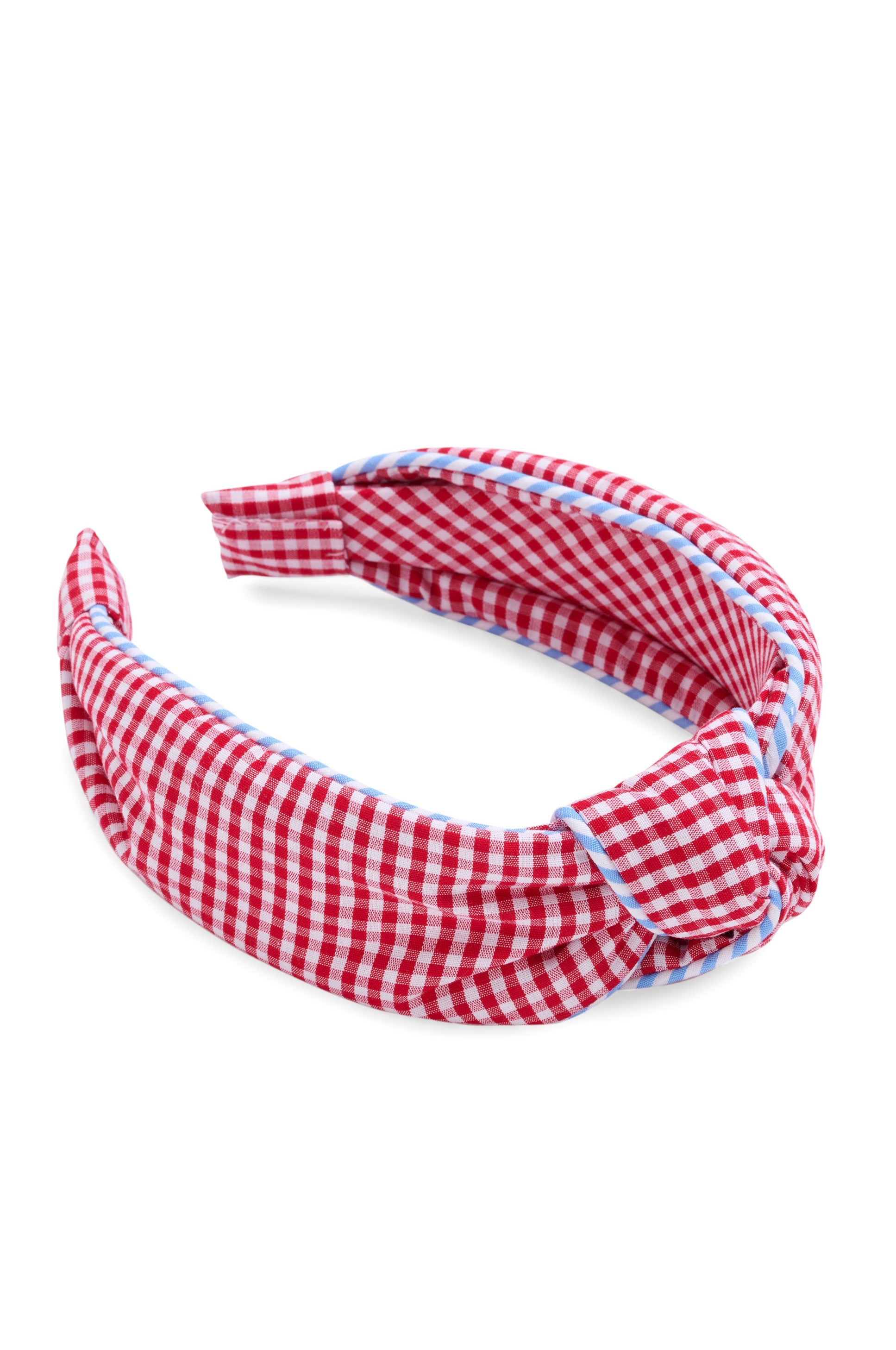The Gingham Knotted Headband by South Moon Under features red and white gingham fabric, a playful side knot, and blue-and-white striped trim—a fun cotton accessory perfect for summer.