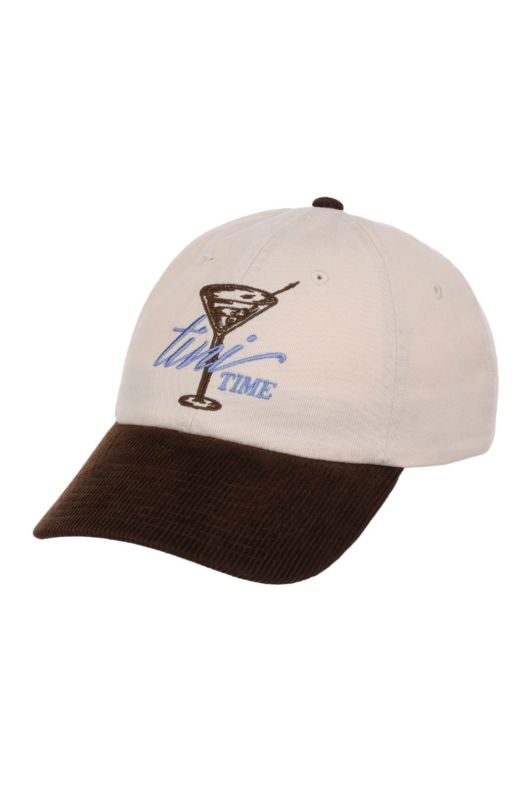 The South Moon Under Smu Tini Time Cap is a beige snapback with a dark brown brim, featuring an embroidered martini glass and the phrase "this TIME" on the front. Its low crown design combines comfort with classic style.