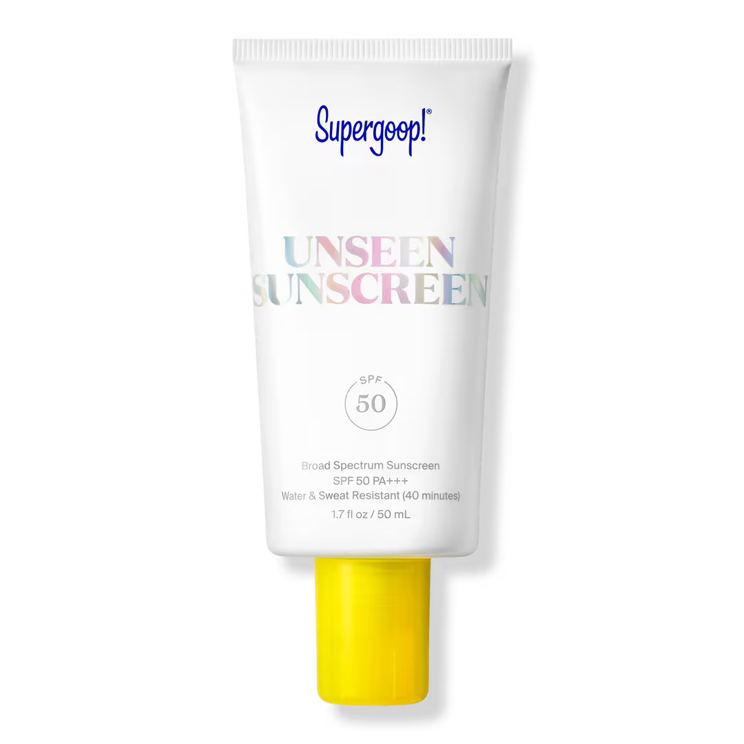 A white tube of Supergoop! Unseen Sunscreen SPF 50 1.7 oz has a yellow cap, iridescent text, and highlights its broad spectrum protection plus water and sweat resistance.