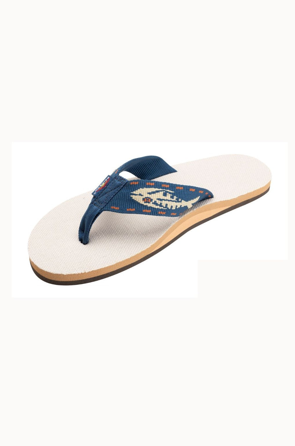 The Rainbow Sandals Single Layer Arch Support Nylon Fish Strap in Navy Multi features a white non-slip sole, tan base, and dark blue straps with a woven geometric pattern in blue, beige, and orange.
