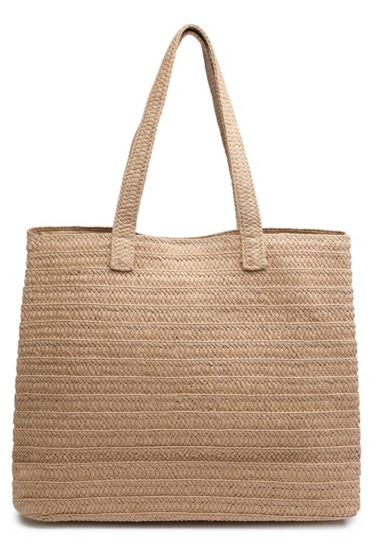 The Urban Expressions Natural Cherry Beach Tote is a large beige straw bag with two matching handles and a textured horizontal braided pattern, offering a simple, natural look.