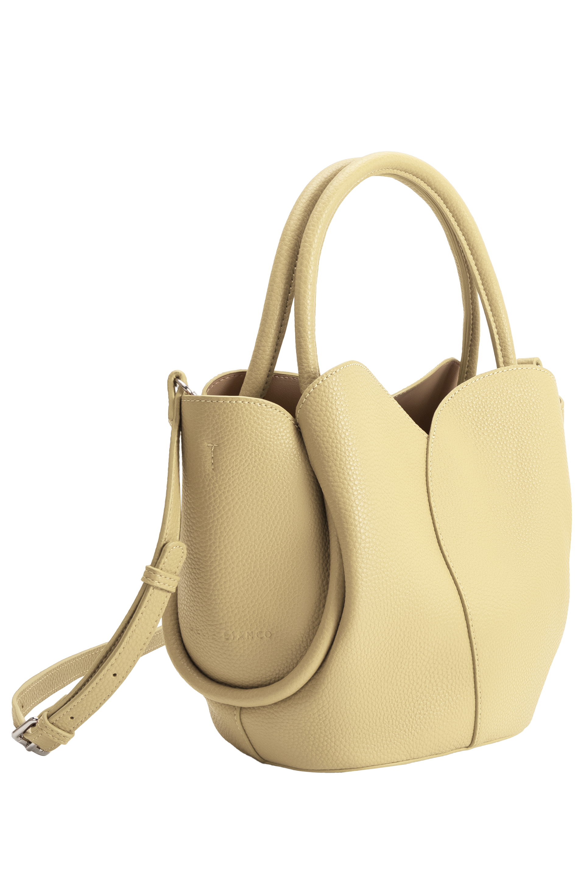 The Tulip Purse by Melie Bianco is a small, light yellow handbag made from recycled vegan leather, featuring two rounded handles, a detachable crossbody strap, textured surface, and a modern curved design.