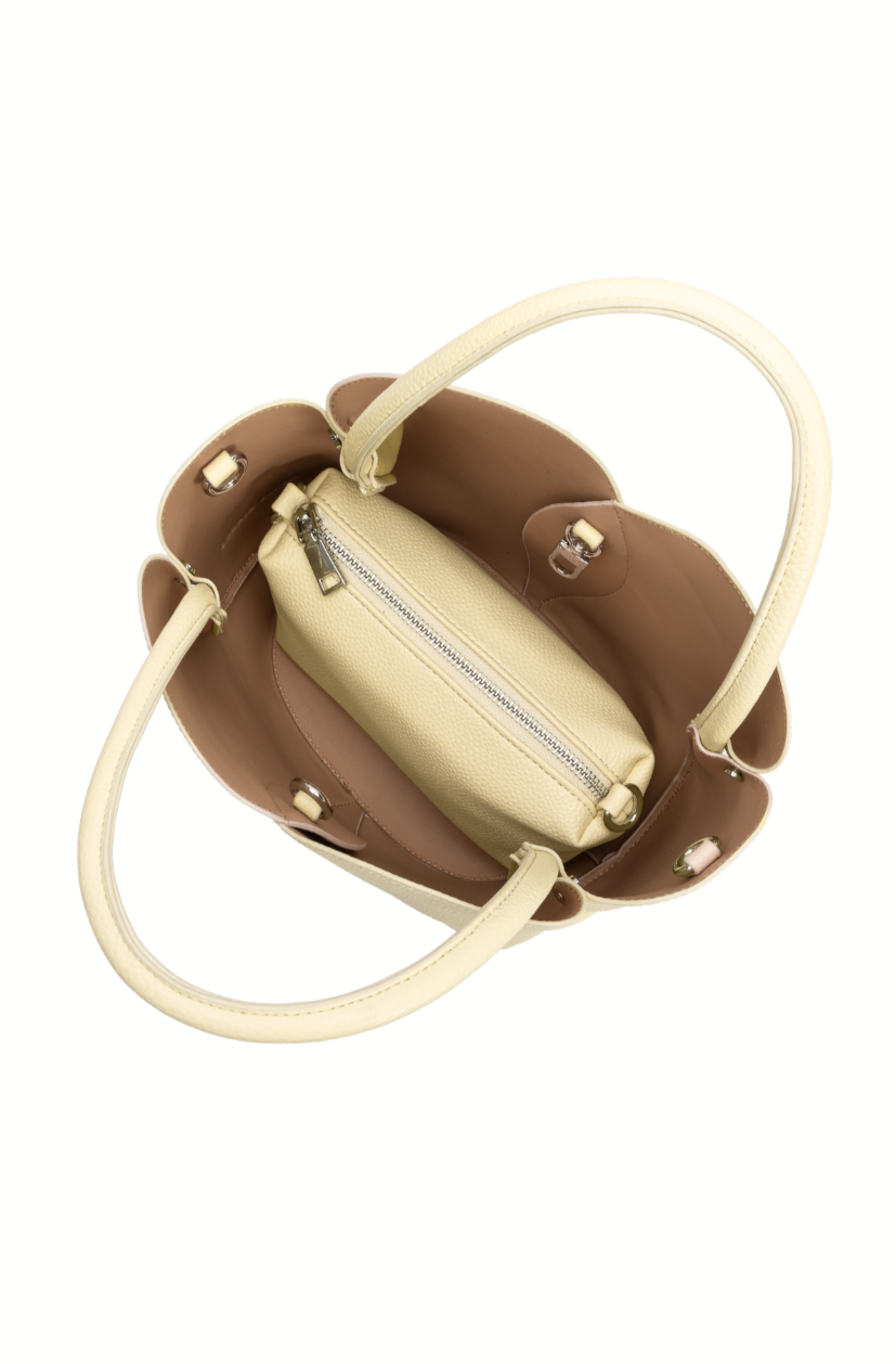 Top view of the Melie Bianco Tulip Purse, an open beige and brown recycled vegan leather handbag with two handles and a removable zip pouch inside.