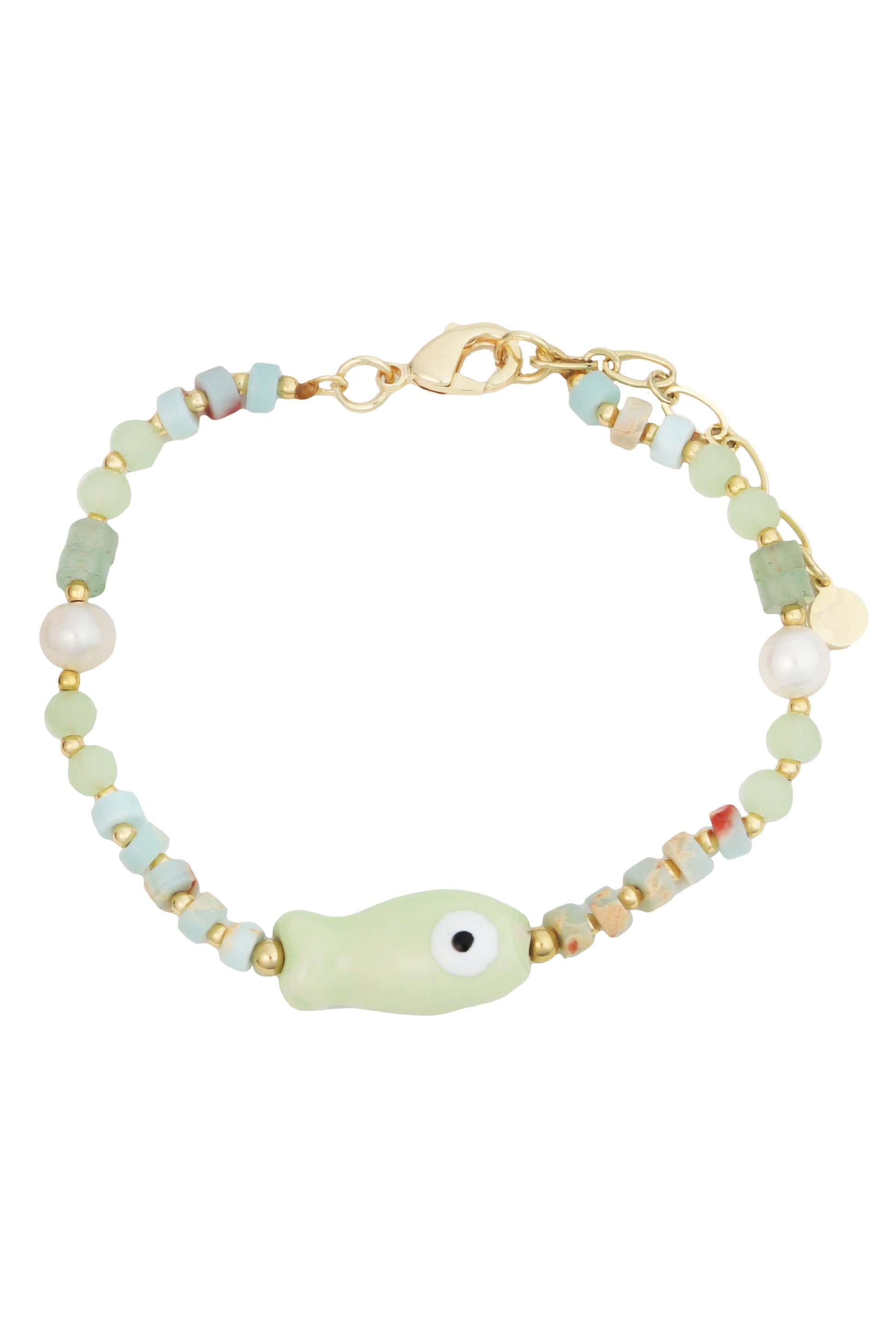 The South Moon Under 6 In Brac Gold Ceramics Fish Link Mint is a mint beaded bracelet with a gold clasp, ceramic fish charm, light green and blue beads, gold accents, and a single pearl bead.