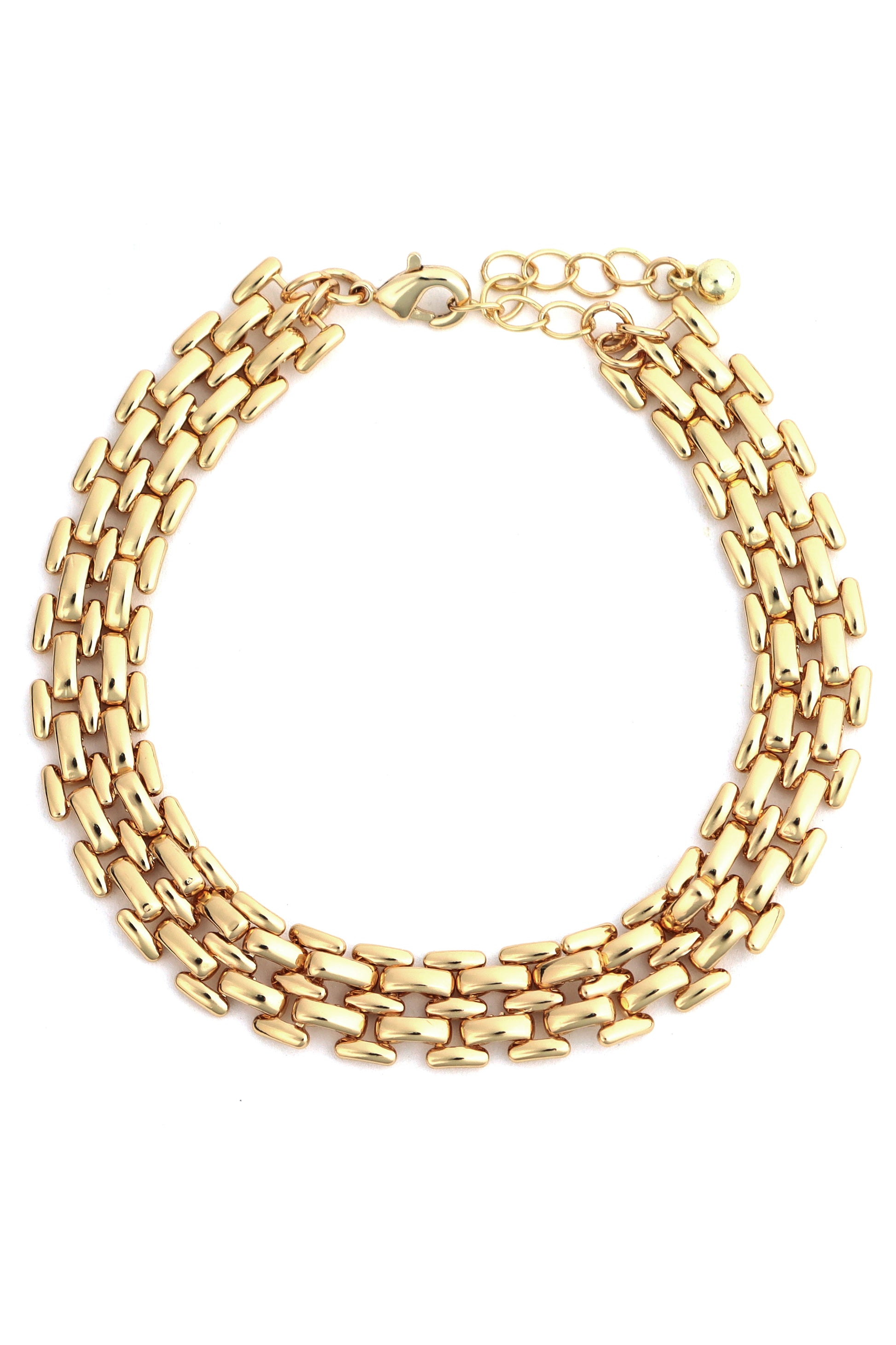 The South Moon Under 6.5 In Brac- Watch Band Gold is a gold-tone brass chain bracelet with three rows of flat, rectangular links and an adjustable clasp. This elegant piece is perfect for both formal and casual occasions.
