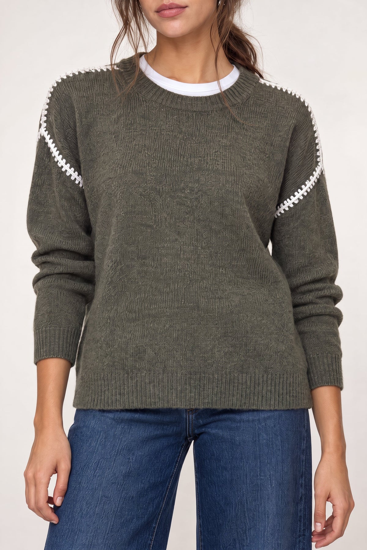 Olive knit sweater with ivory contrast trim on sleeves and crew neckline.