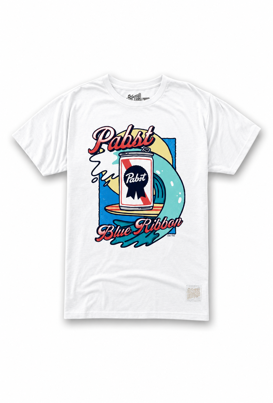 The Pabst Blue Ribbon Wave tee by Original Retro Brand is a white tri-blend shirt with a graphic of a PBR can surfing, stylized text above and below, and a tagless collar for comfort.
