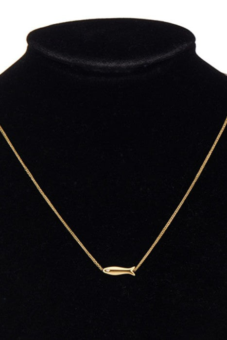 The South Moon Under Hyperallergenic Stainless Steel Fish Necklace features a small gold fish pendant for a modern, nautical look—perfect minimalist jewelry.