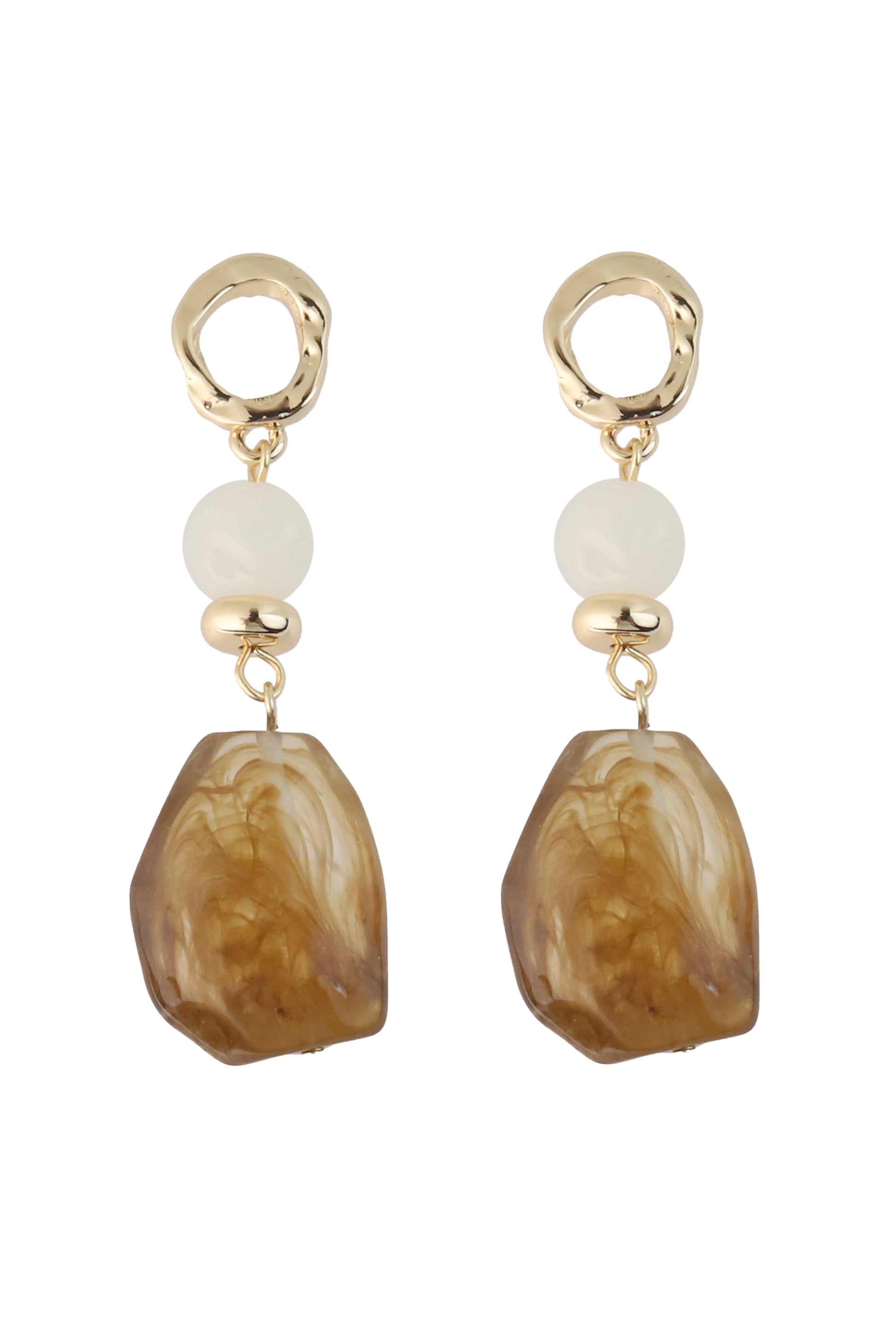 South Moon Under’s Brown Resin Drop Earrings feature gold-plated brass irregular hoops, white round beads, small gold beads, and large brown marbled resin drops for a bold gold-toned statement.