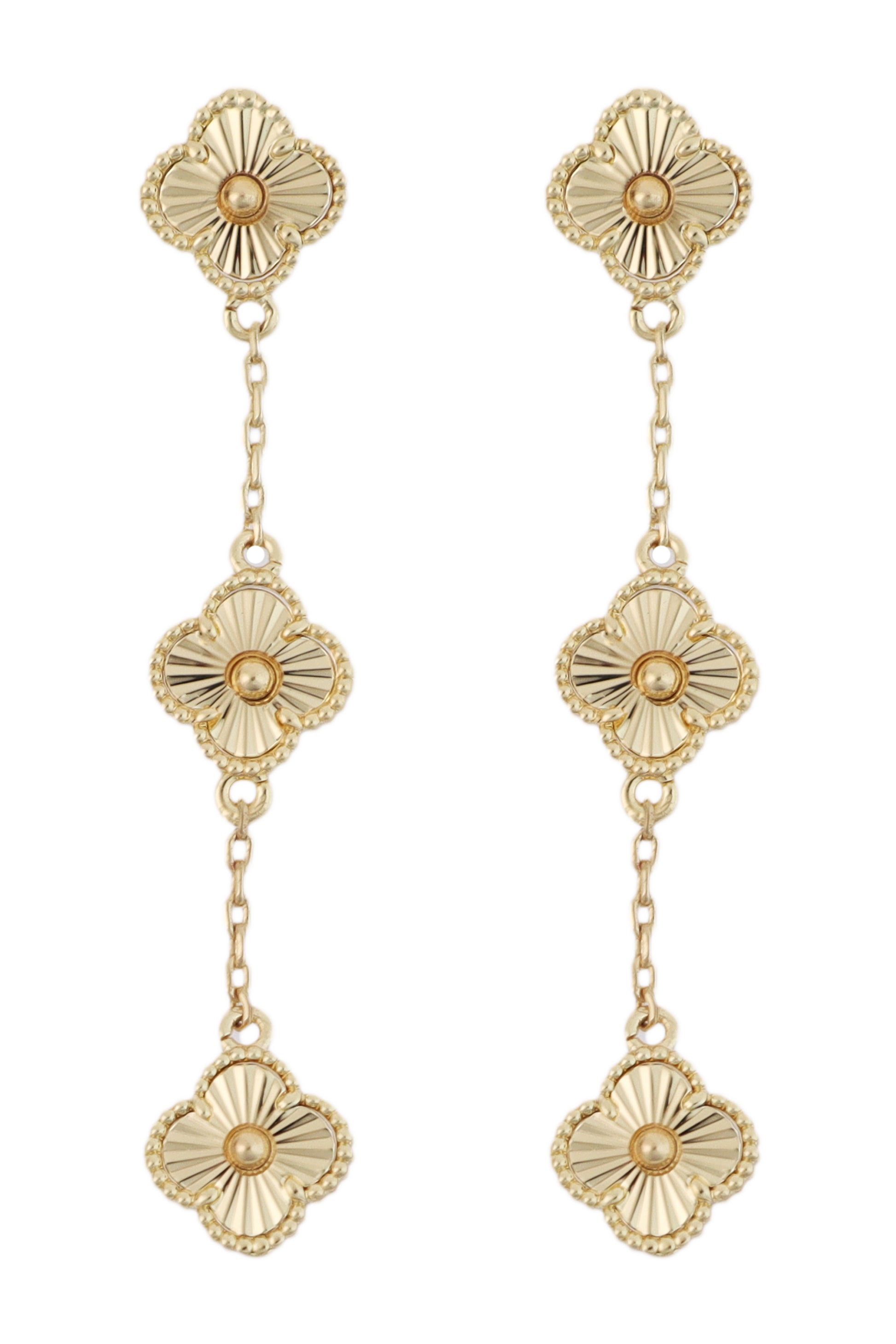 The Clover Tiered Earring by South Moon Under is a pair of gold botanical earrings featuring three connected floral shapes with sunray-textured petals and a central bead for a delicate, elegant look.