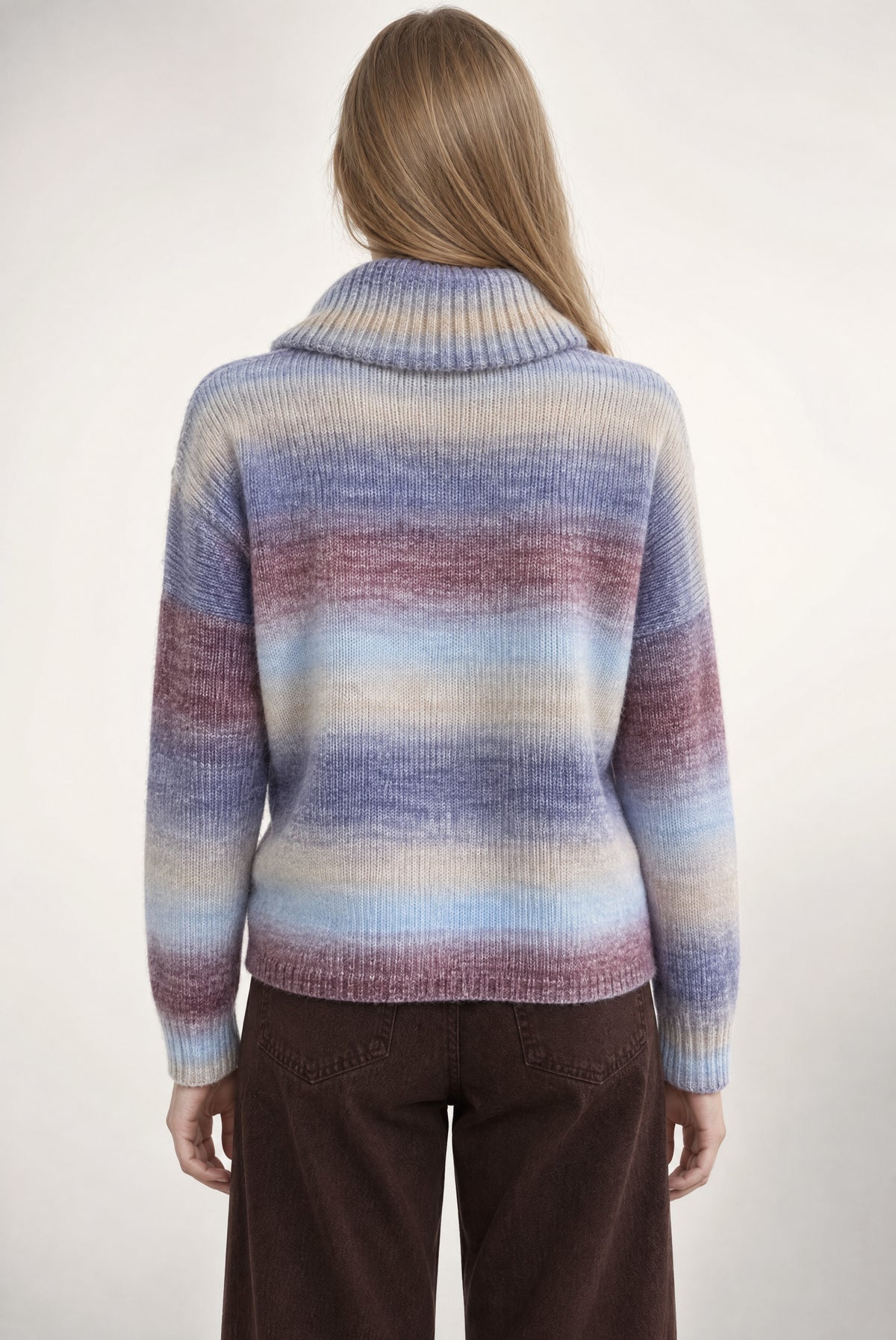 Ribbed turtleneck sweater with horizontal color-blocking in blue, purple, pink, and cream stripes.
