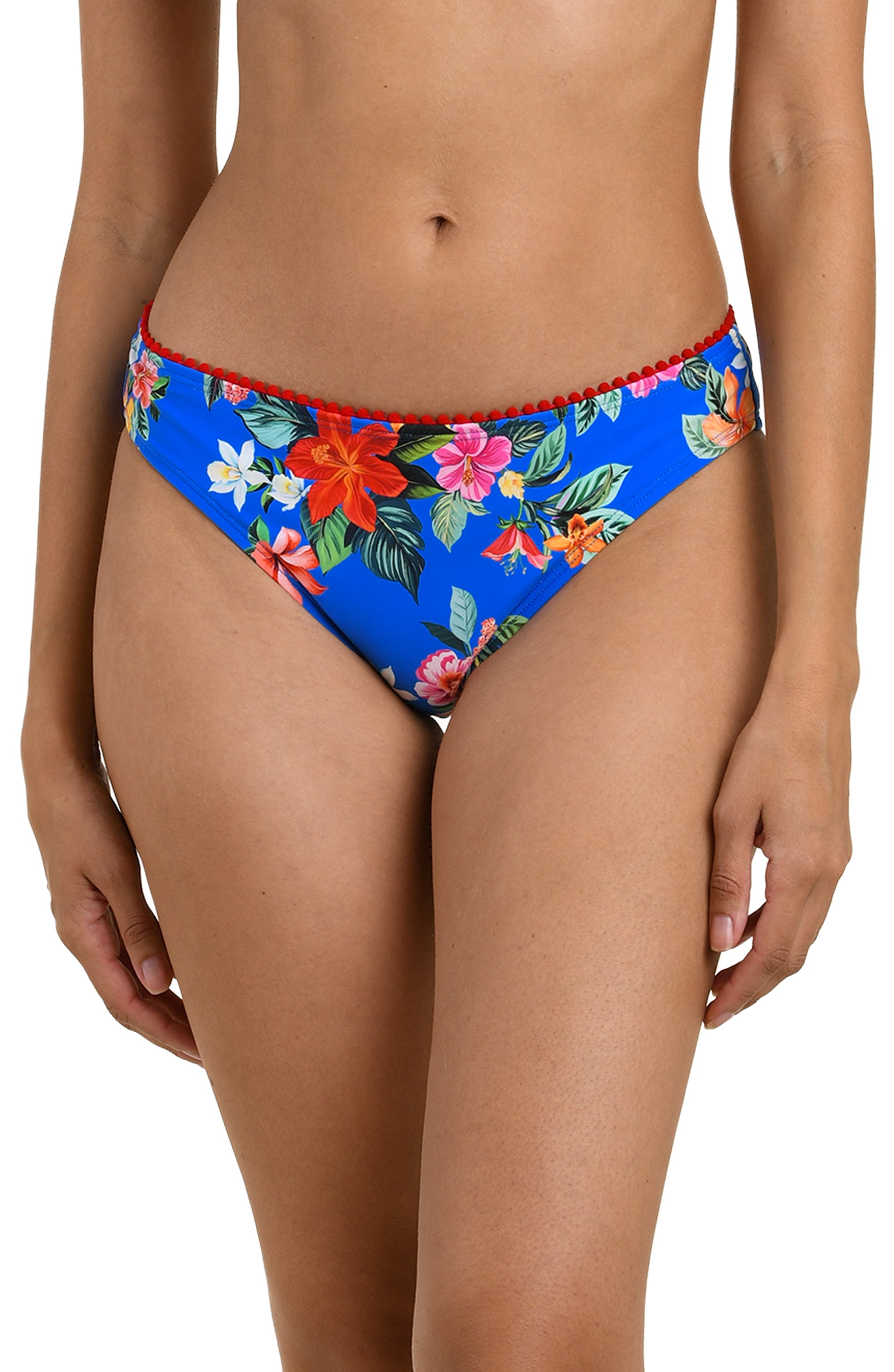A person wears La Blanca's Modern Oasis Solid Hipster bikini bottoms in a solid color with moderate rear coverage, shown from mid-torso to upper thighs against a white background.