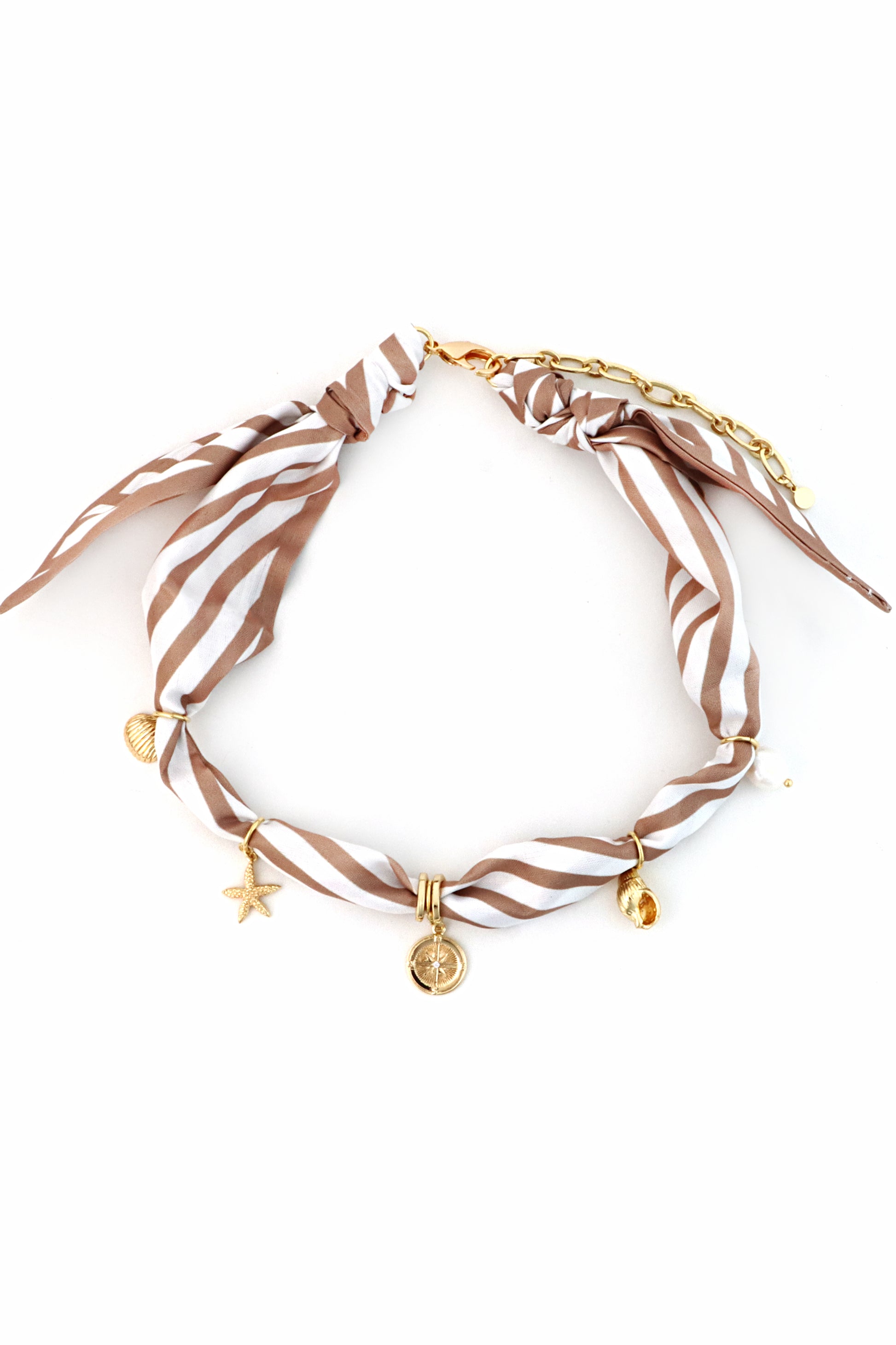 The Charm Scarf Necklace by South Moon Under features gold accents, a 16-inch length, and gold-plated brass chain with small star, shell, coin, and teardrop charms. Color: Gold.