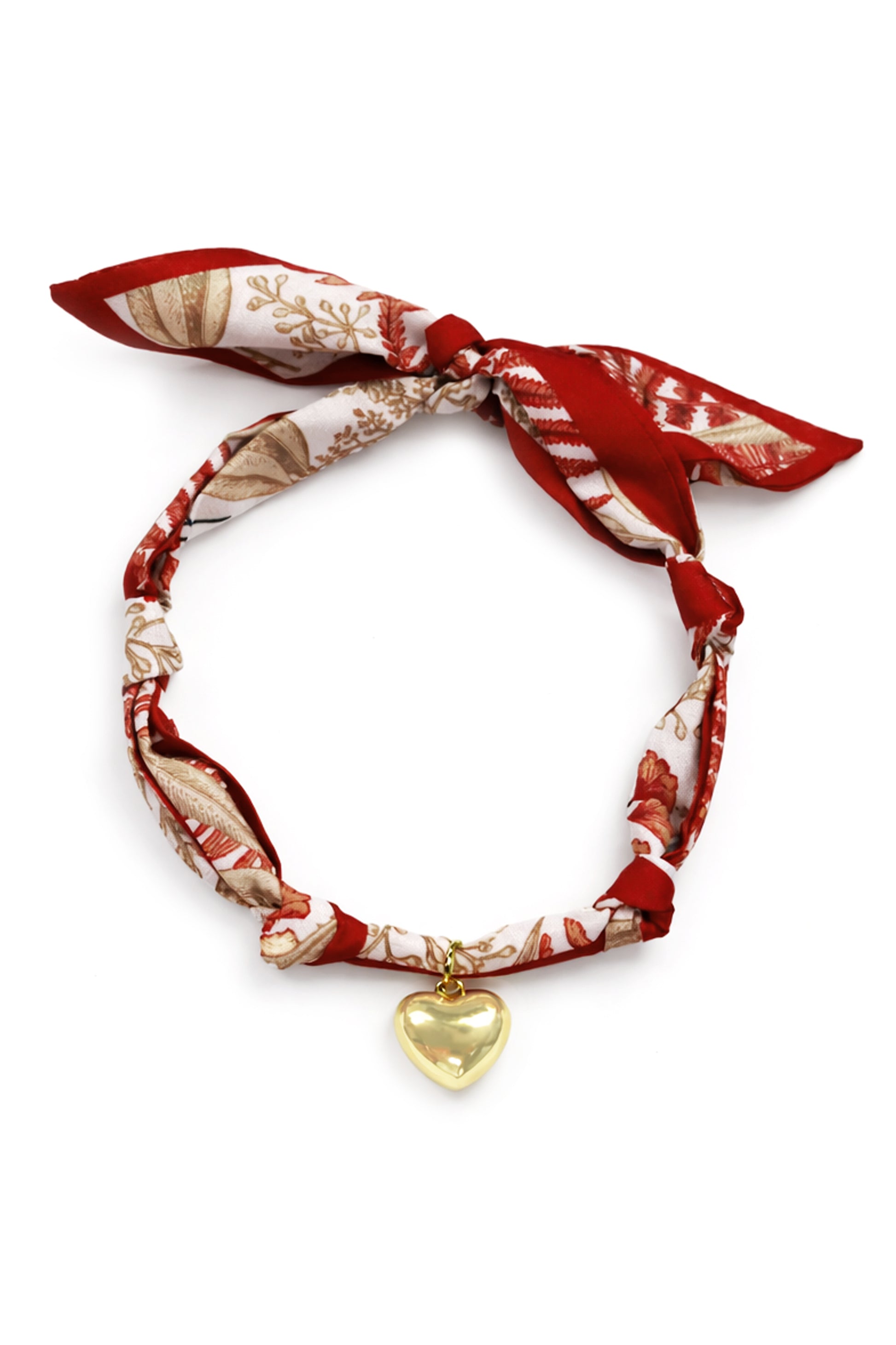 The South Moon Under Red Scarf Heart Necklace features a red multi silk scarf with a knotted closure and a central gold heart pendant.