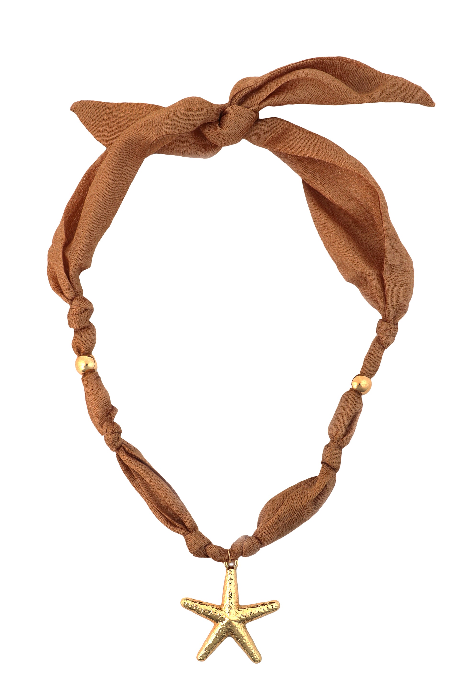 The Silk Starfish Fabric Necklace by South Moon Under features a gold silk blend fabric, gold-plated beads, and a gold starfish pendant, tied with a loose adjustable knot at the top.