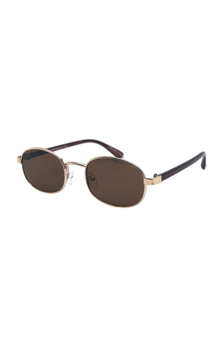 The Origin Sunnies by South Moon Under feature thin gold metal frames, black arms, and oval-shaped monotone lenses, displayed against a white background.