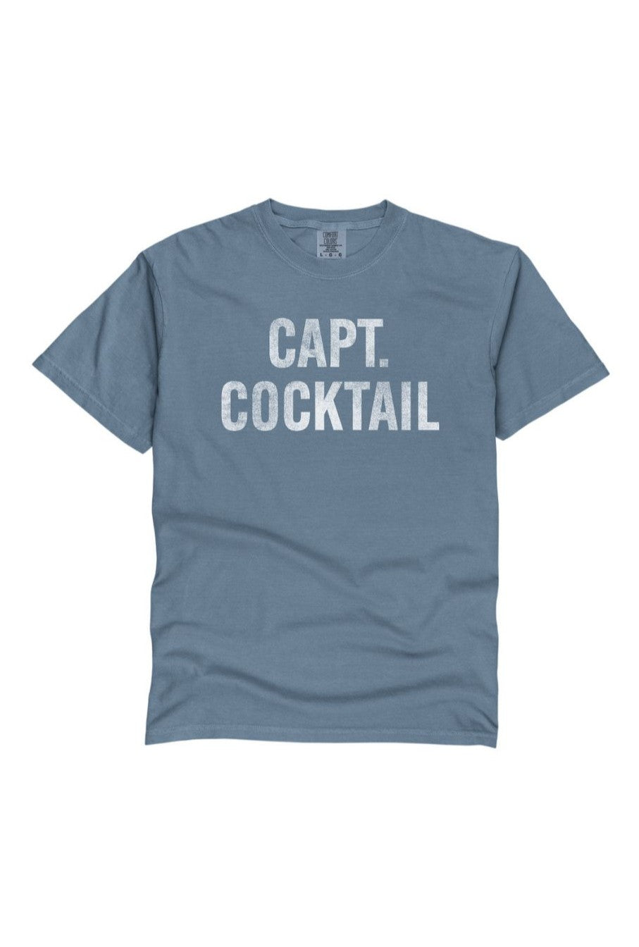 The Original Retro Brand Captain Cocktail tee is blue, features "CAPT. COCKTAIL" in bold white letters across the chest, and has a comfy tagless collar.
