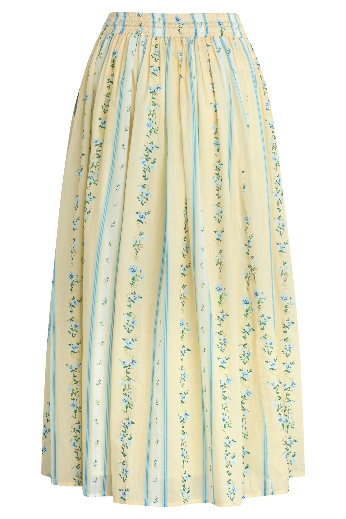 The Via Nicola Skirt by Bila 77 is a high-waisted, mid-length yellow skirt with blue vertical stripes and small blue floral patterns, featuring a smocked waistband for a full, flowing silhouette.