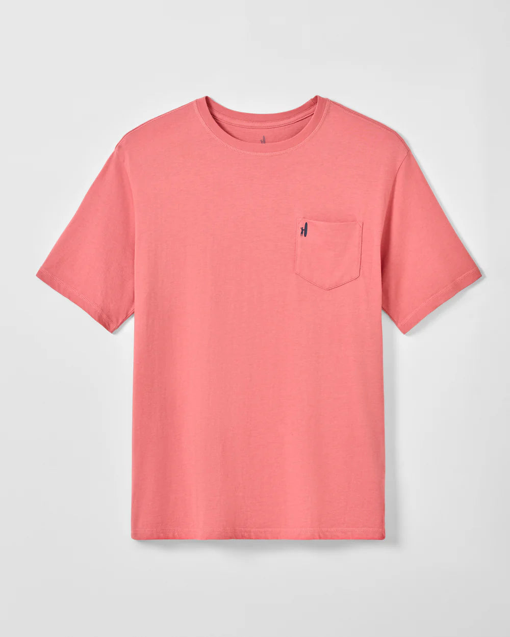 The Johnnie-O "American Dream" tee is a plain coral pink short sleeve shirt with a small left chest pocket, perfect for any surfer dude. Displayed on a white background.