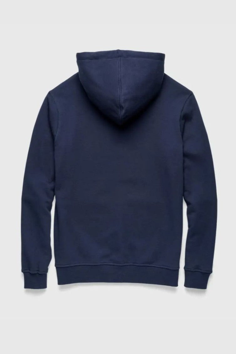 The Surfside Supply Co. Marine Long Sleeve French Terry Hoodie is displayed from the back on a light gray background, featuring a plain navy design with a drawstring hood, long sleeves, and ribbed cuffs in super soft cotton.