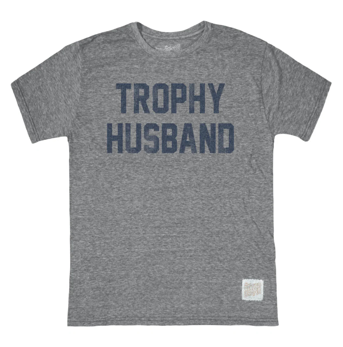 A streaky forest tri-blend unisex tee by Original Retro Brand, this super soft short-sleeve shirt features bold TROPHY HUSBAND text and a small white label sewn near the bottom right hem.