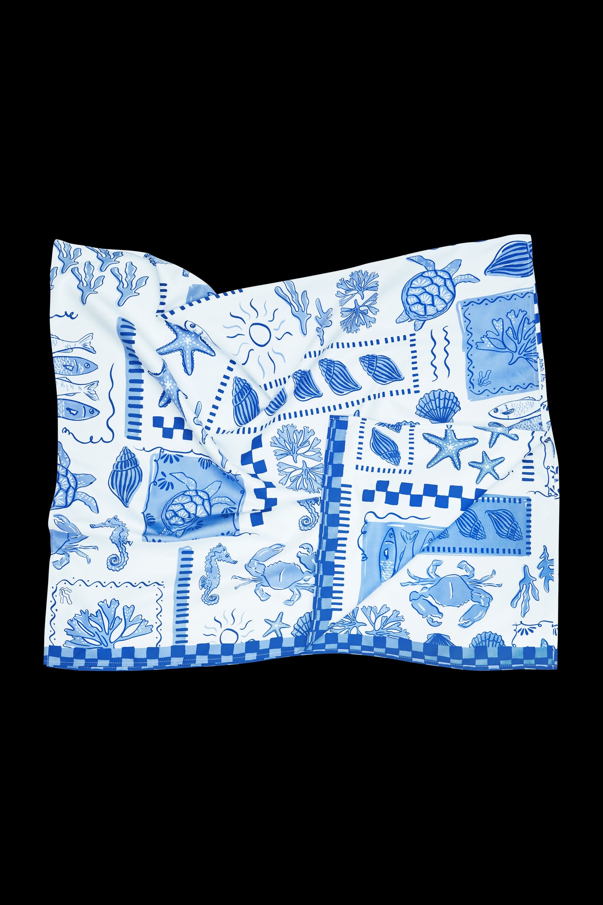 The Grecian Shores Large Towel by South Moon Under features blue sea creature illustrations on a white, patchwork-style quick-dry microfibre towel, blending convenience with coastal style.