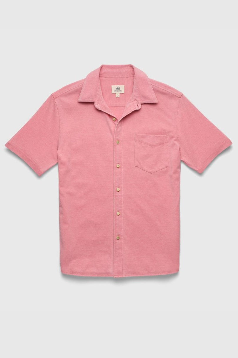 The Surfside Supply Co. Tony Short Sleeve Burnout Knit Shirt features a button front, collar, and single chest pocket in solid pink, shown on a plain white background.