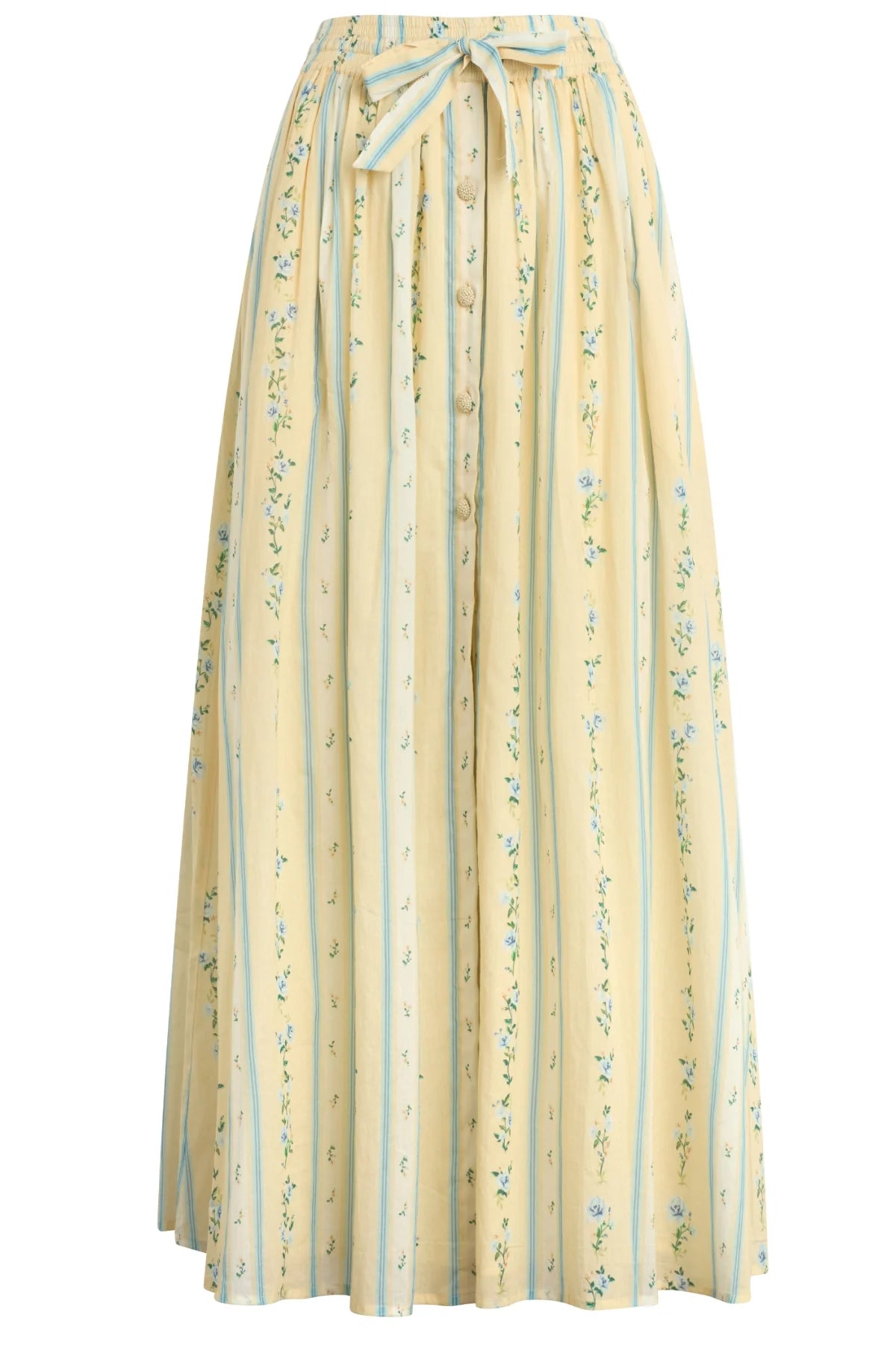 The Bila 77 Via Nicola Skirt is a long, high-waisted skirt in Yellow Multi with vertical blue and white floral stripes, front decorative buttons, and a matching tie-front bow at the waist.