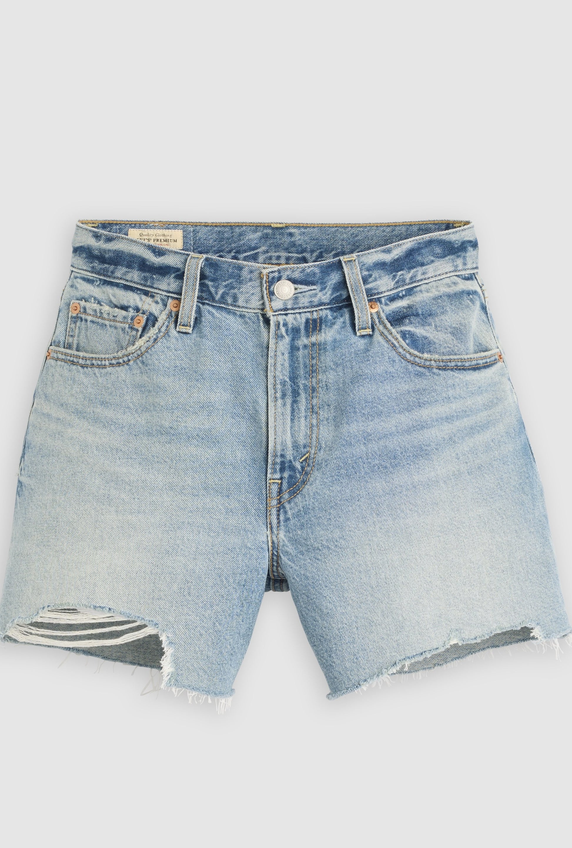 The Levi's Ribcage Short Zip Blow My Mind features light blue 100% cotton denim with frayed hems, a small rip on the left leg, front and back pockets, button closure, and visible stitching. The mid-rise shorts are shown laid flat.