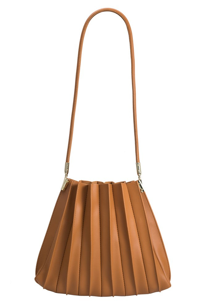 The Carrie Tan by Melie Bianco is a premium handbag in tan vegan leather, featuring a pleated fan-like design, single long shoulder strap, and gold-tone hardware at the strap attachment.