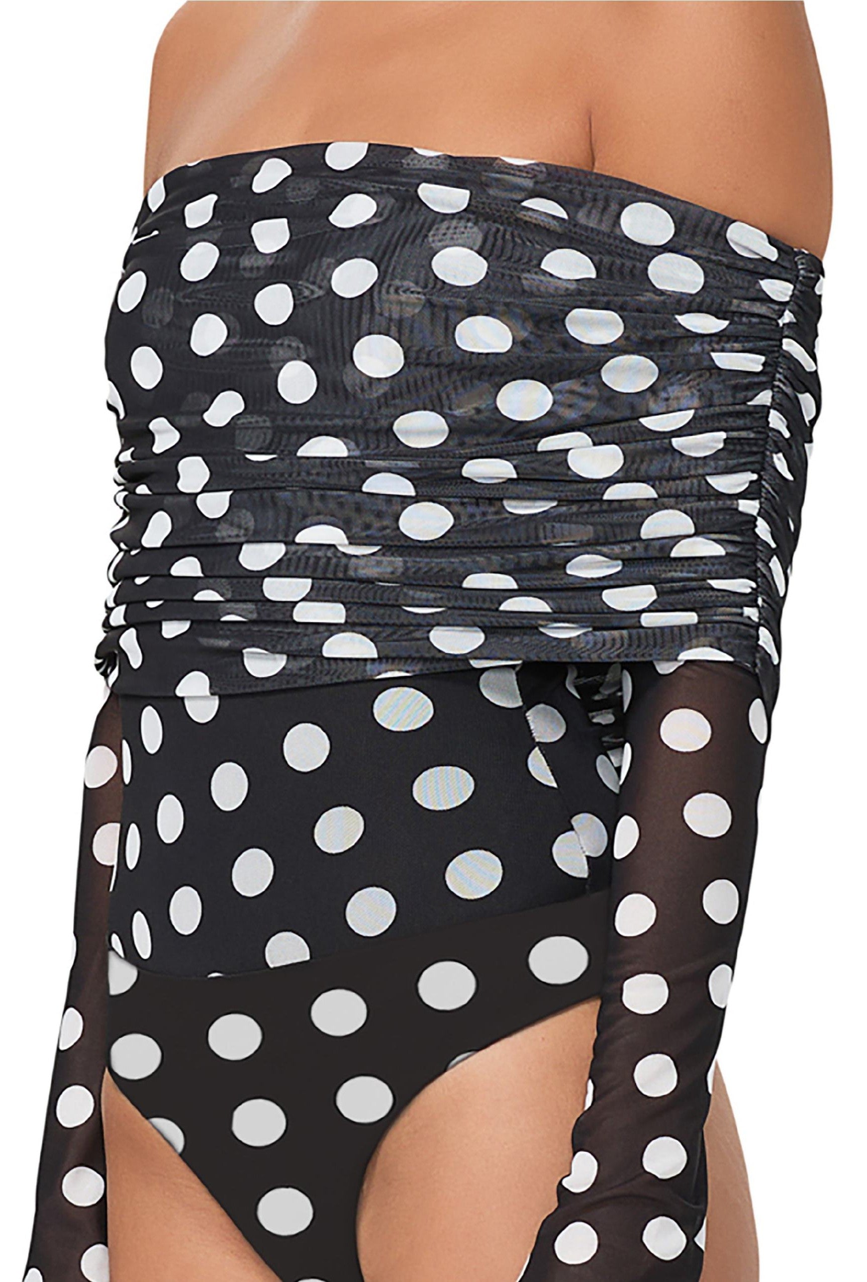 A person wears the AFRM Maxine Bodysuit, an off-shoulder black piece with sheer long sleeves and white polka dots. It features ruched detailing on the chest and arms and a snap clasp at the base for convenience.